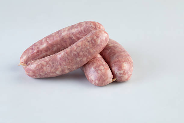 istock Fresh pork sausage isolated nature background with clipping path 2221993843
