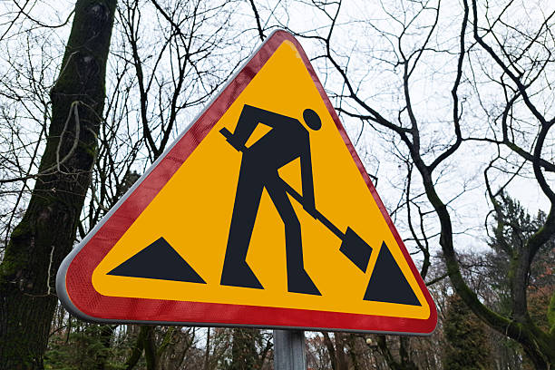 Triangular warning sign indicating roadworks, Brussels, Belgium