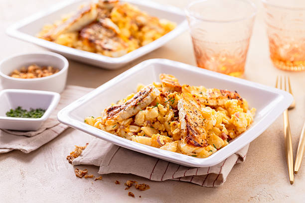 istock German egg dumplings with bacon, fried onions and grilled Halloumi cheese 2221997813