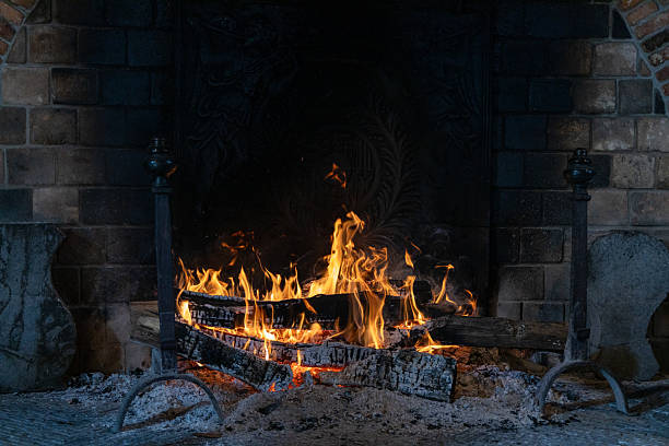 Cozy Rustic Fireplace with Glowing Flames and Warm Ambiance Indoors