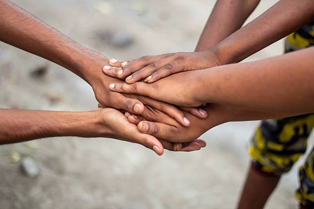 istock Many hands joined together for the purpose of partnership 2222008021