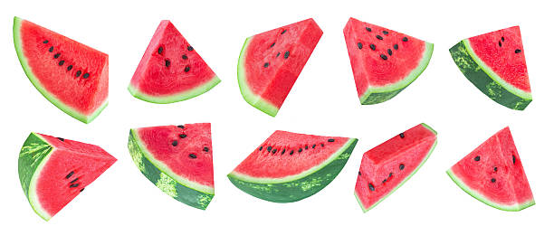 istock Levitating Watermelon pieces isolated on white. Flying Cutted watermelon  pieces  explotion. Watermelon fruit collection.  Top view. Flat lay. Pattern  2222009605