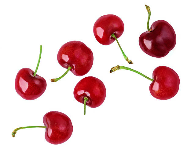 istock Levitating Red Cherries isolated on white. Flying sweet cherry.  Explosion. Top view. Flat lay. Pattern  2222011650