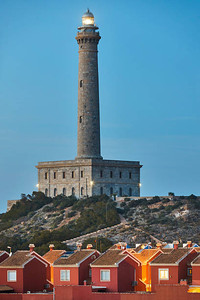 istock Cabo de Palos stone lighthouse at sunset. Mediterranean coastline, Spain 2222016075