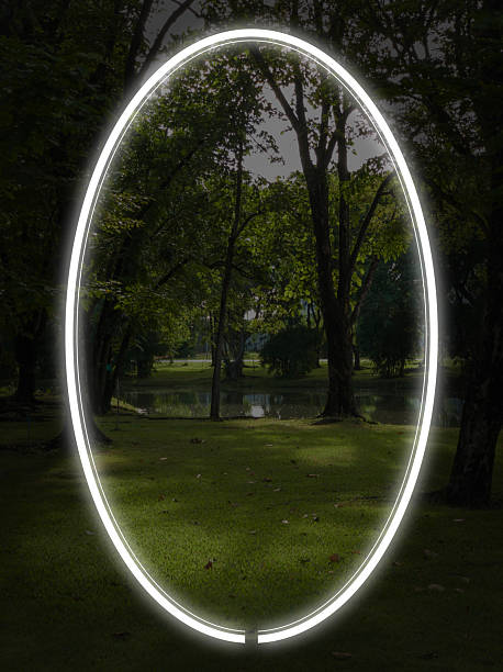 istock Dark forest and trees in a park. Behind is a pond or lake. 2222019766