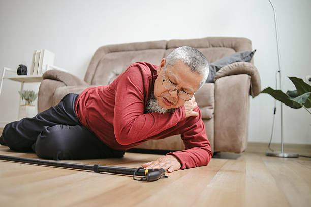 istock Senior Man With Walker Stick Falling On The Floor At Home 2222020217