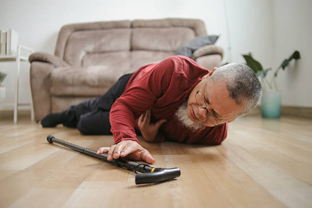 istock Senior Man Try To Take Walking Stick After Falling On The Floor 2222020292