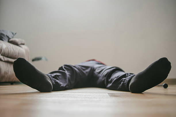Close Up Of Legs Man Falling On The Floor, Fainted Lying Down On The Floor