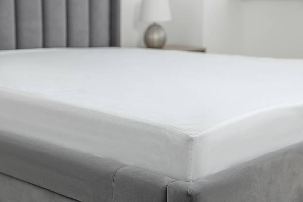 istock Bed with clean linens at home, closeup 2222024903