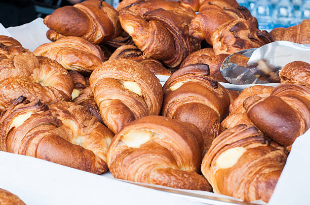 group of croissants with jam, vanilla cream and honey,italy