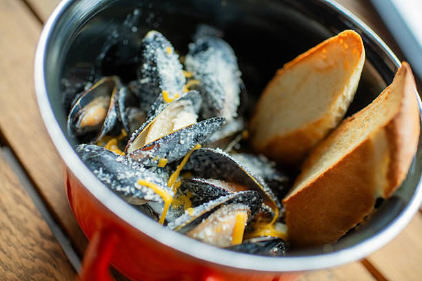 Mussels in cheese sauce in a restaurant