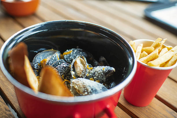 Mussels in cheese sauce in a restaurant