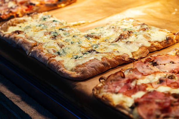 istock Pizza pieces to go on a stall in pizzeria 2222034156