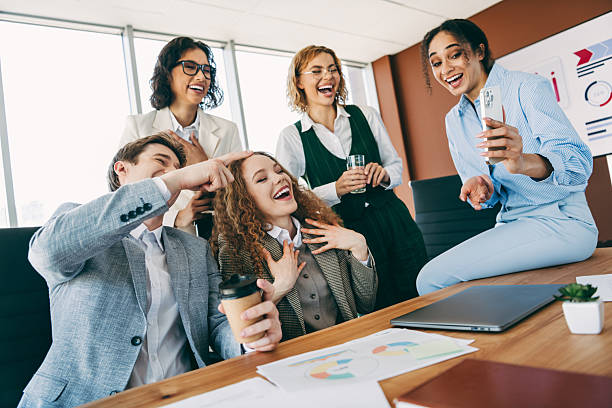 istock Diverse Business Team Sharing a Lively Moment at the Office During Break 2222039615