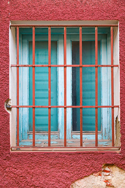 istock Stone facade with window with wrought iron lattice in Spain 2222042231
