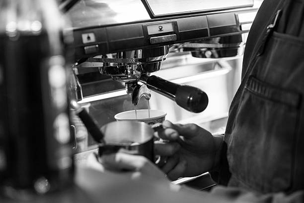 Brewing Coffee at a Cafe With a Barista Making Espresso in a Charming Atmosphere During the Morning Rush