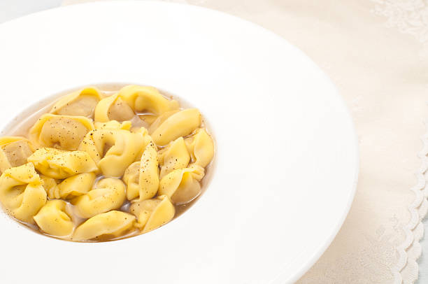 istock Italian ravioli stuffed with meat cooked in broth with cheese 2222052979