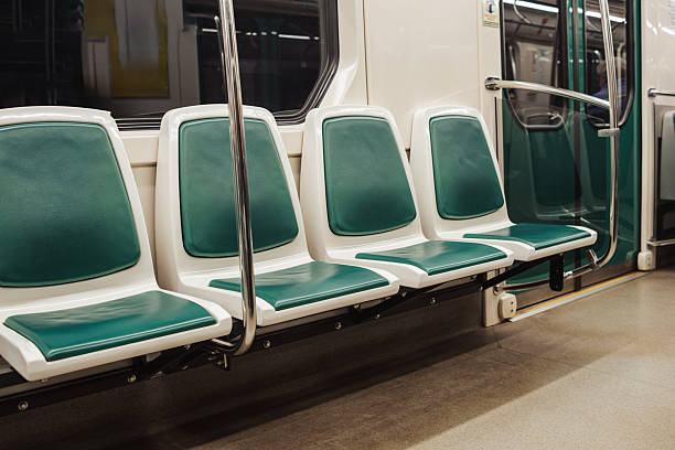 istock Clean and Empty Subway Train Seats Waiting for Passengers During a Quiet Morning Commute in an Urban Setting 2222054745