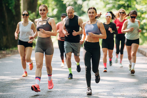 istock Marathon conception, front view. Group of runners are together outdoors 2222058794