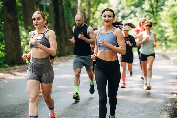 istock Marathon conception, front view. Group of runners are together outdoors 2222058805