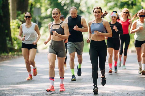 istock Marathon conception, front view. Group of runners are together outdoors 2222058806
