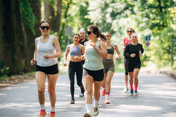 istock Marathon conception, front view. Group of runners are together outdoors 2222058821