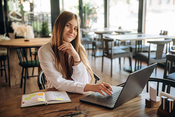 istock Young woman is in the cafe at daytime 2222061856