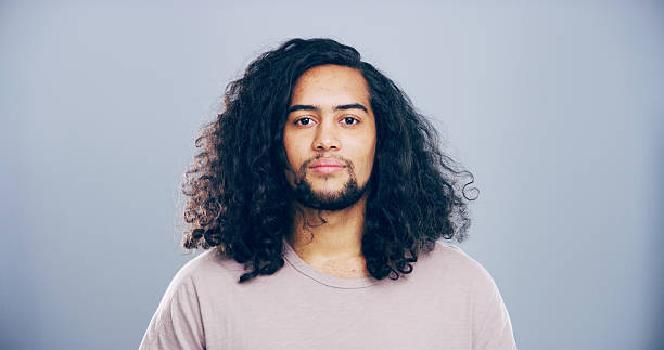 istock Portrait, space and student with man on gray background for development, education or learning. College, scholarship and university with confident person on studio mockup for back to school or study 2222063666