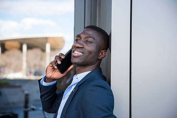 istock Happy young black businessman talking on smartphone 2222065389