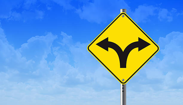 istock Crossroads Decision Road Sign 2222065685