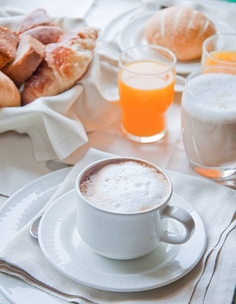 istock Fantastic breakfast of cappuccino, croissants , orange juice and biscuits 2222065888