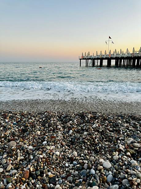 Turkish coast with Mediterranean sea and pebbles