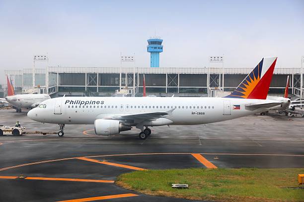 Philippine Airlines (PAL) Airbus A320 at Ninoy Aquino International Airport (NAIA), Manila. The airport handles 36.7 million passengers annually (2015).