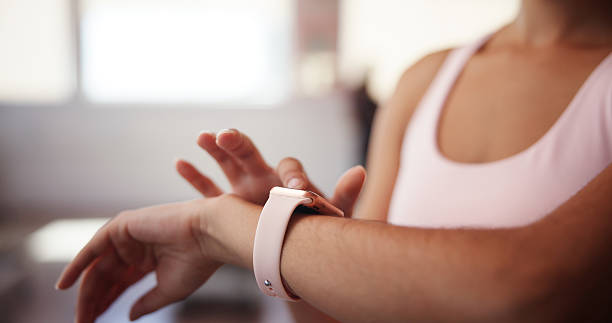 istock Hands, pilates and time with woman in studio, tracking performance progress of training routine. Exercise, fitness and watch with arm of athlete person in gym for challenge, milestone or workout 2222079358