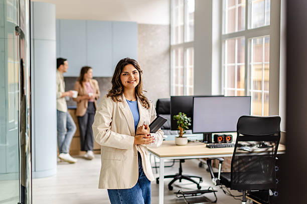 istock Modern office environment showcases collaboration among young professionals during a busy workday 2222084860