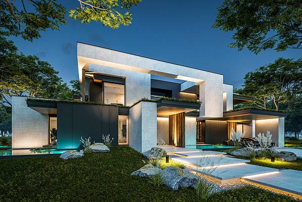 istock 3d rendering of two-story house with concrete facade in night 2222085619