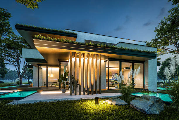 istock 3d rendering of two-story house with concrete facade in night 2222085632