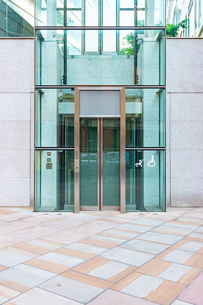 istock Modern glass elevator entrance in london's financial district 2222085640