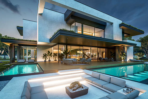 istock 3d rendering of two-story house with concrete facade in night 2222085660