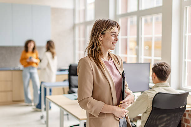 istock Modern office workspace filled with young professionals engaged in collaborative activities 2222085801