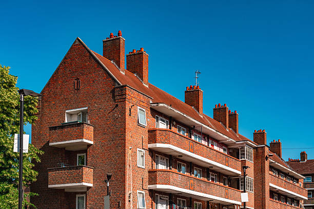 istock Red brick apartment building with balconies in london, uk 2222085817