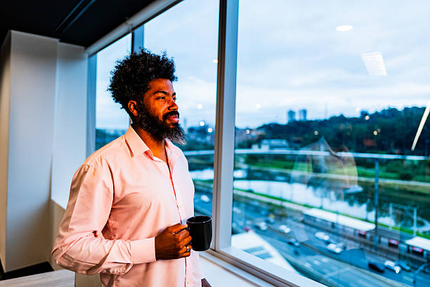 istock Businessman contemplating on the office 2222088025