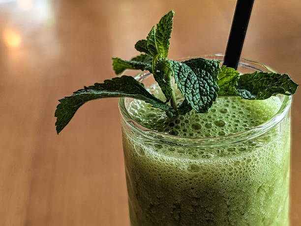 istock Horizontal image of green smoothie with spinach and mint 2222088913