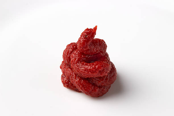 istock a bunch of red tomato ketchup paste isolated on a white background 2222092028