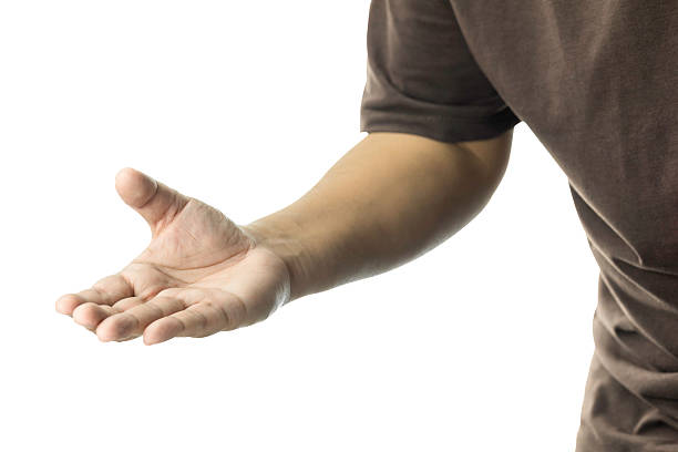 Open human hand with palm facing upwards, seemingly offering or presenting something. Isolated arm and hand wearing a brown shirt. isolated on white background with clipping path.