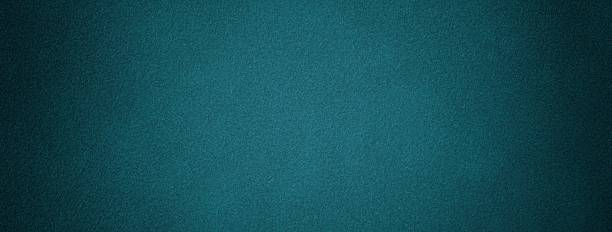 istock Dark teal suede fabric background with matte velvet texture, emerald tones and soft felt surface in macro. 2222096181