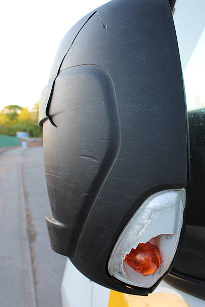 istock Damaged Vehicle Side Mirror with directional light visible taken at the road side 2222108134