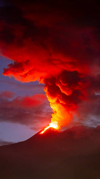 istock Eruption with towering red smoke plume at dusk 2222110899
