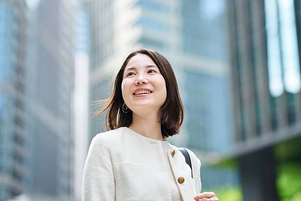 istock A woman commuting in a business district 2222111383