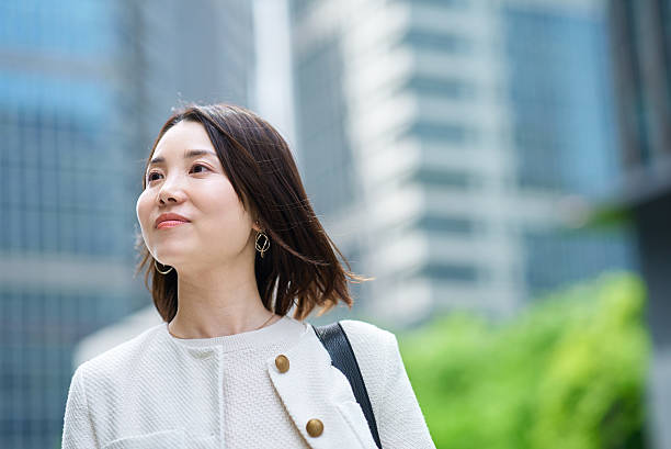 istock A woman commuting in a business district 2222111437